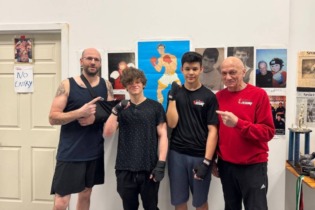 (From left to right) Assistant coach Tyler Olson, Ethan Bartholet, Karter Mott and coach Wally Doern. (Laísa Condé/Quesnel Cariboo Observer)